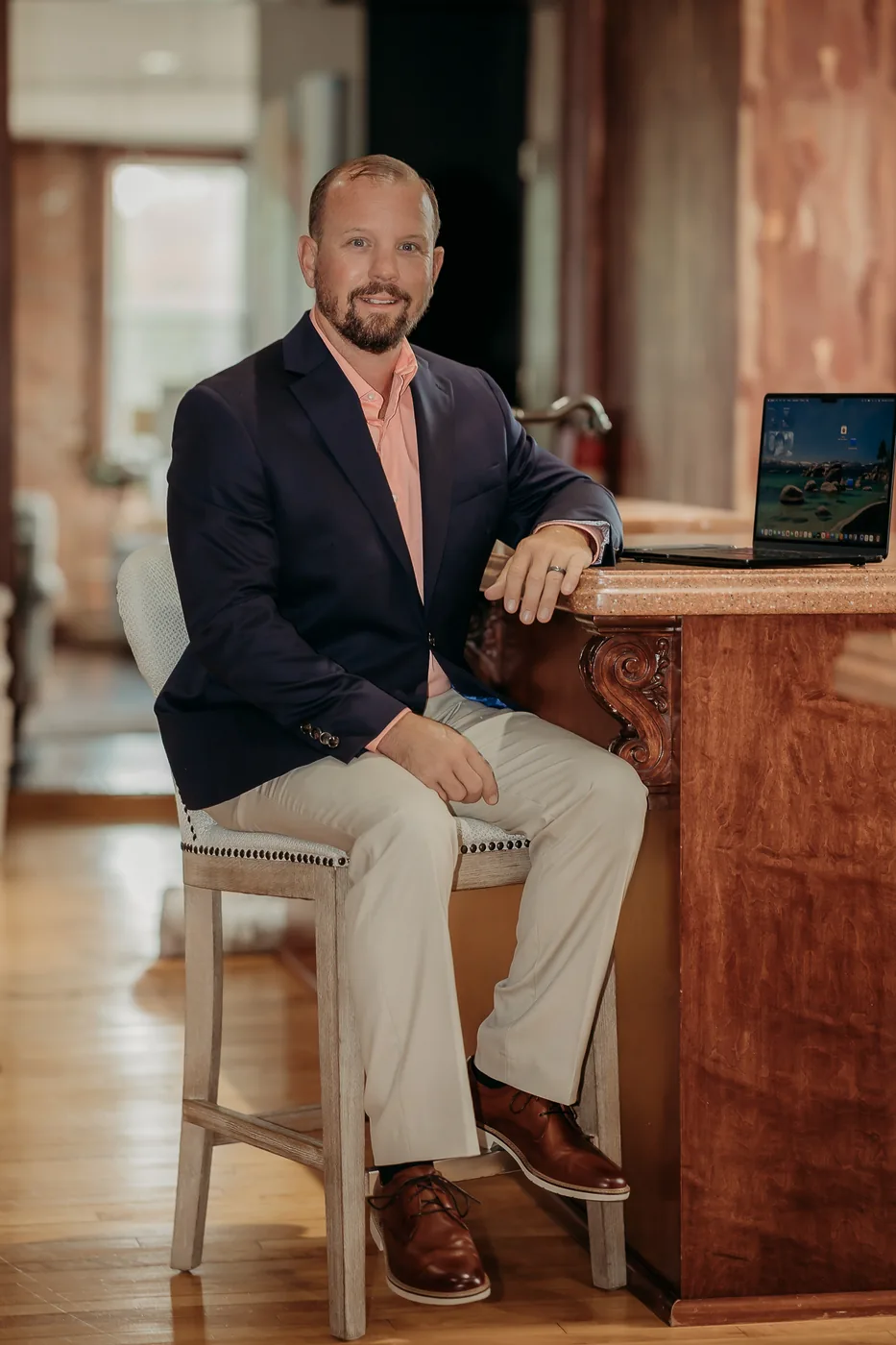 Dave Dempsey at his desk, working through a transaction